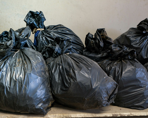 black bin bags filled with rubbish