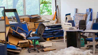 old broken office equipment stored in office room